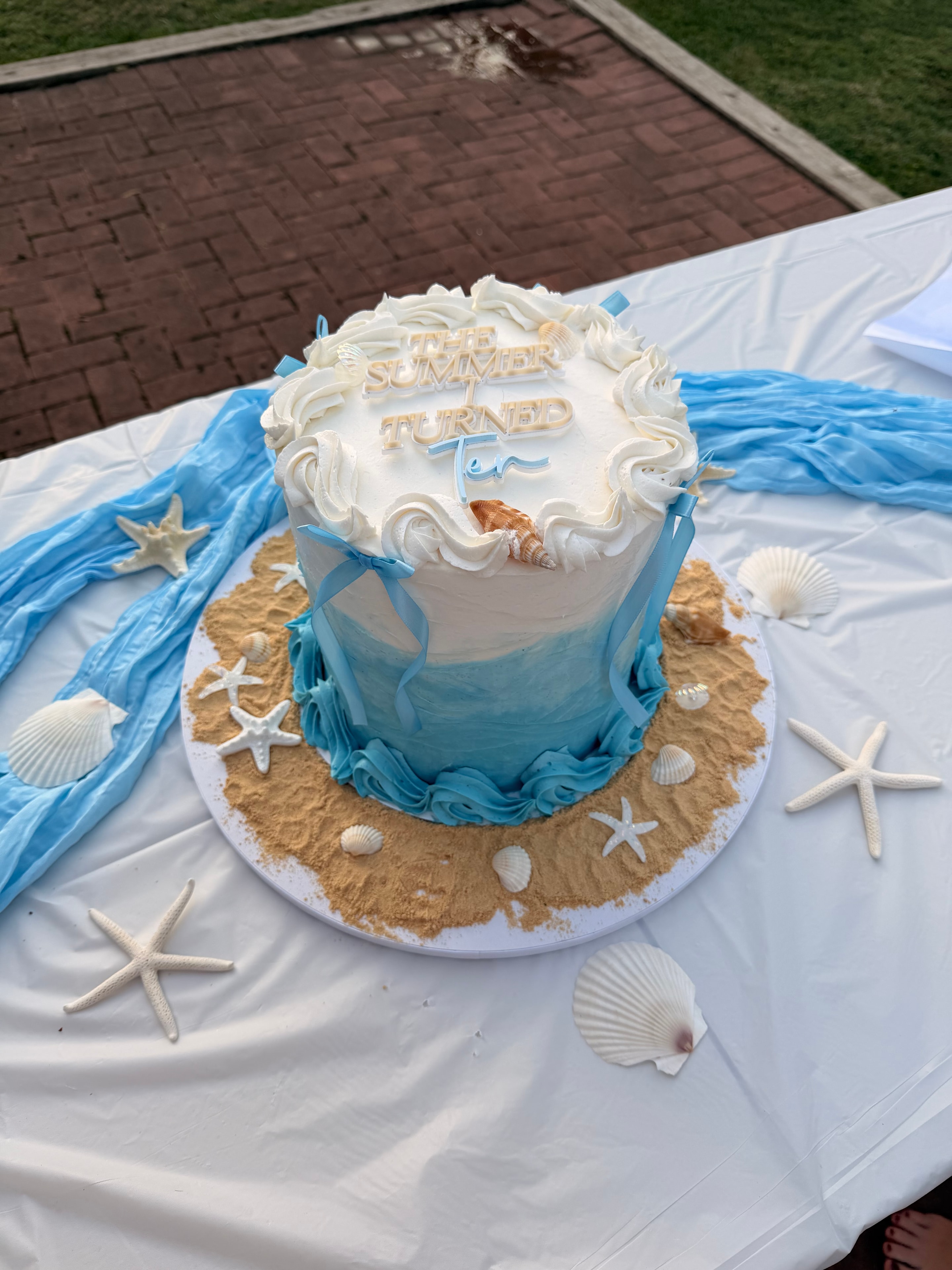 Ocean Splash — A vibrant ocean-themed birthday cake bursting with crashing waves and coastal charm — perfect for your little beach lover's big day