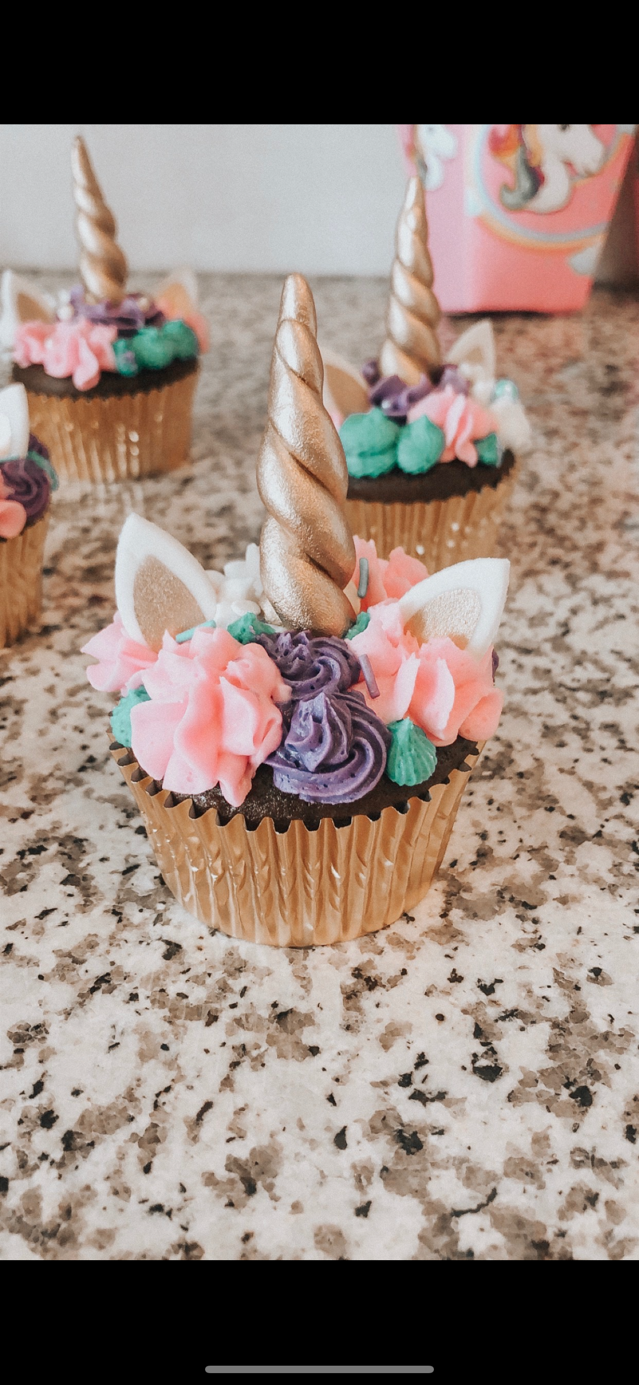 Unicorn Magic — Whimsical unicorn cupcakes swirled in pastel rainbow buttercream with shimmering horn toppers — pure enchantment in every bite
